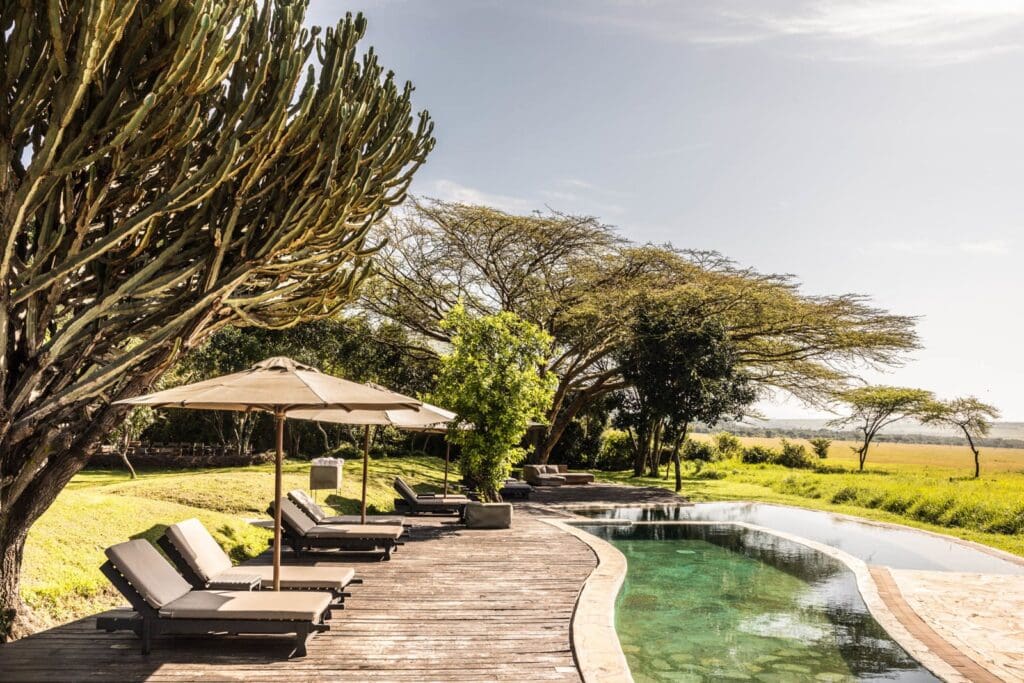 The pool and grounds at andBeyond Kichwa Tembo Luxury Safari Tented camp